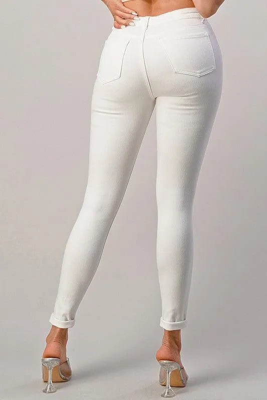 white skinny jeans with rips
